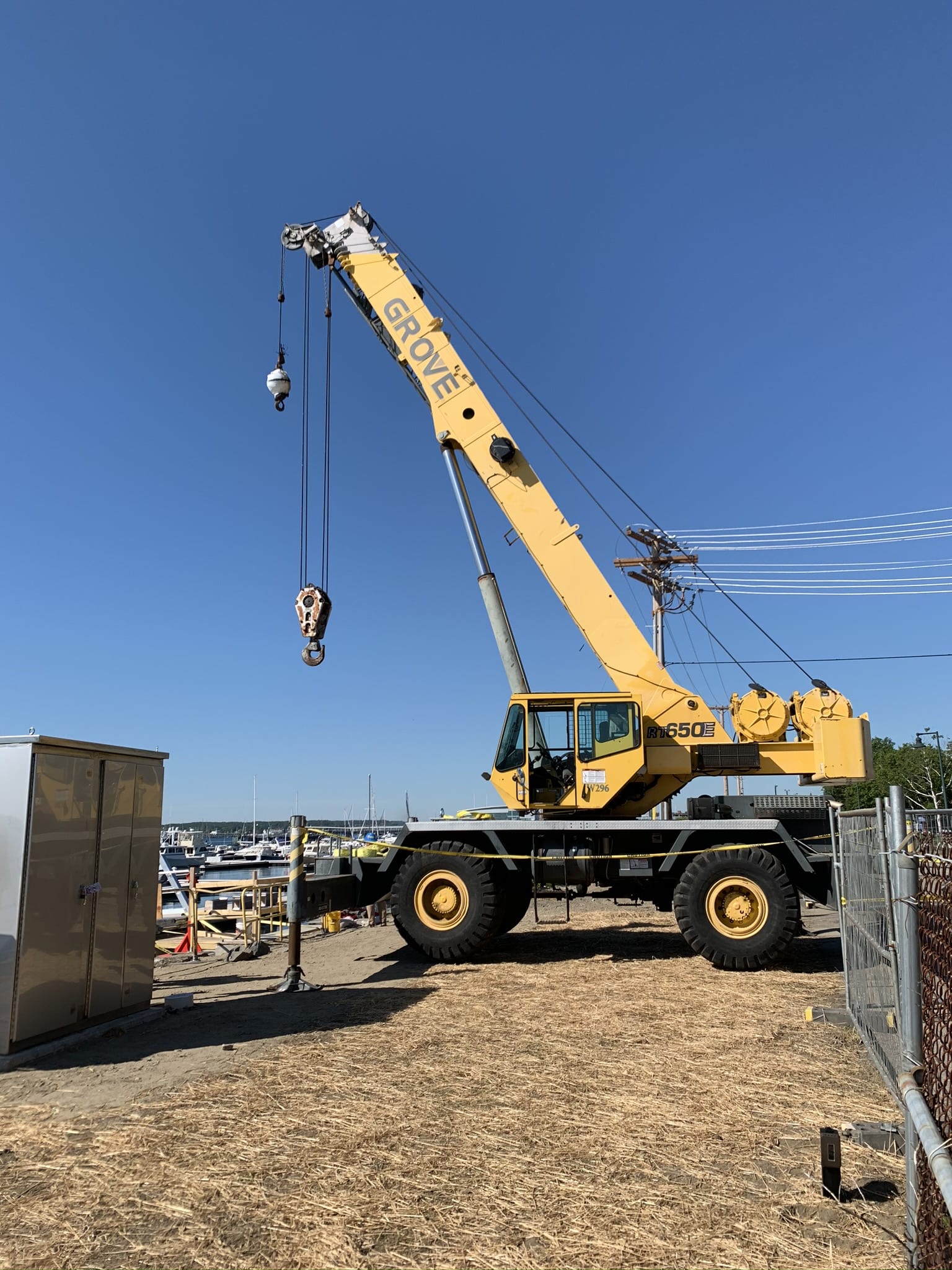 Mayo enterprises crane supporting a construction project in portland maine